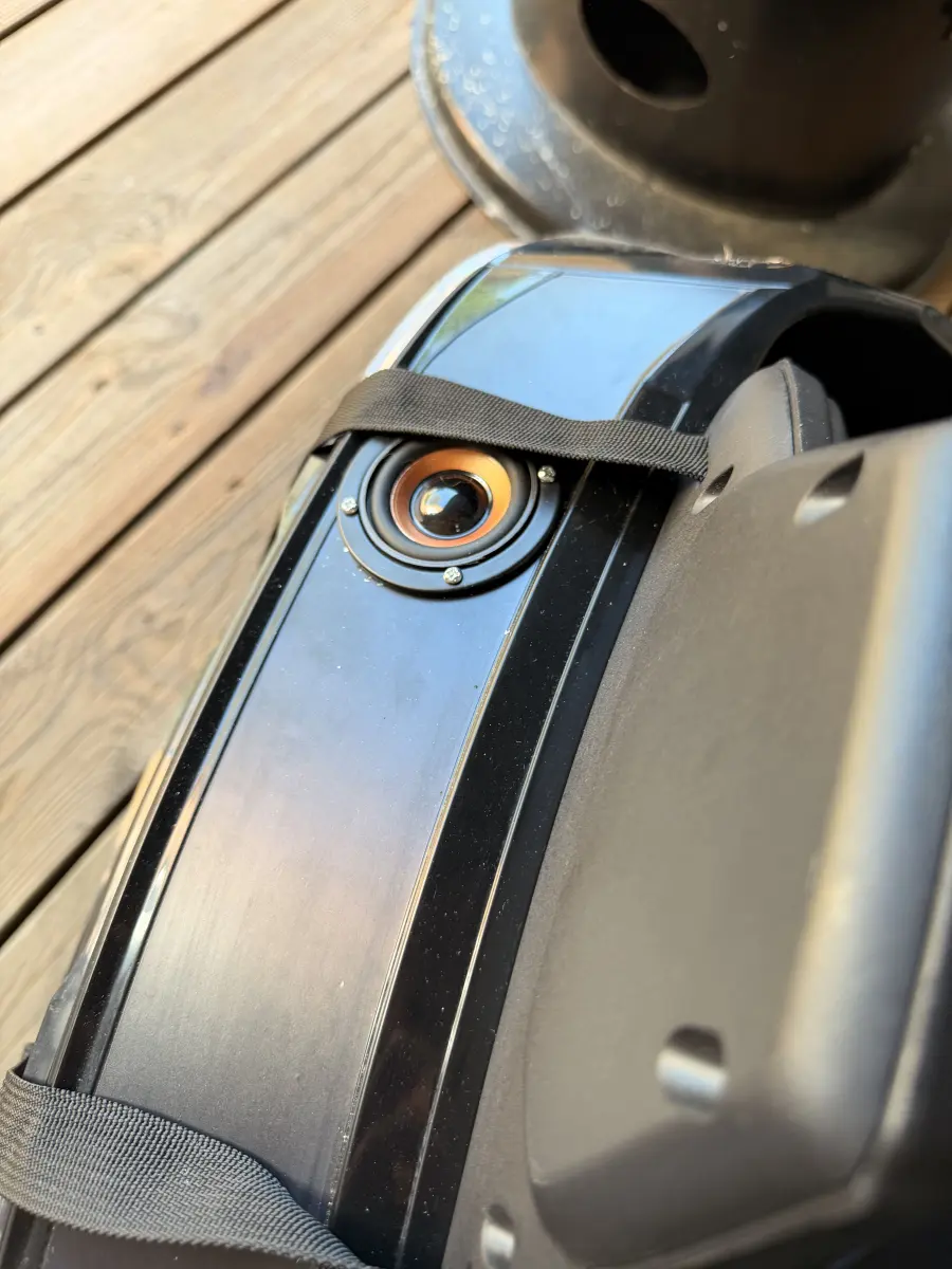 The speaker mounted into the car body